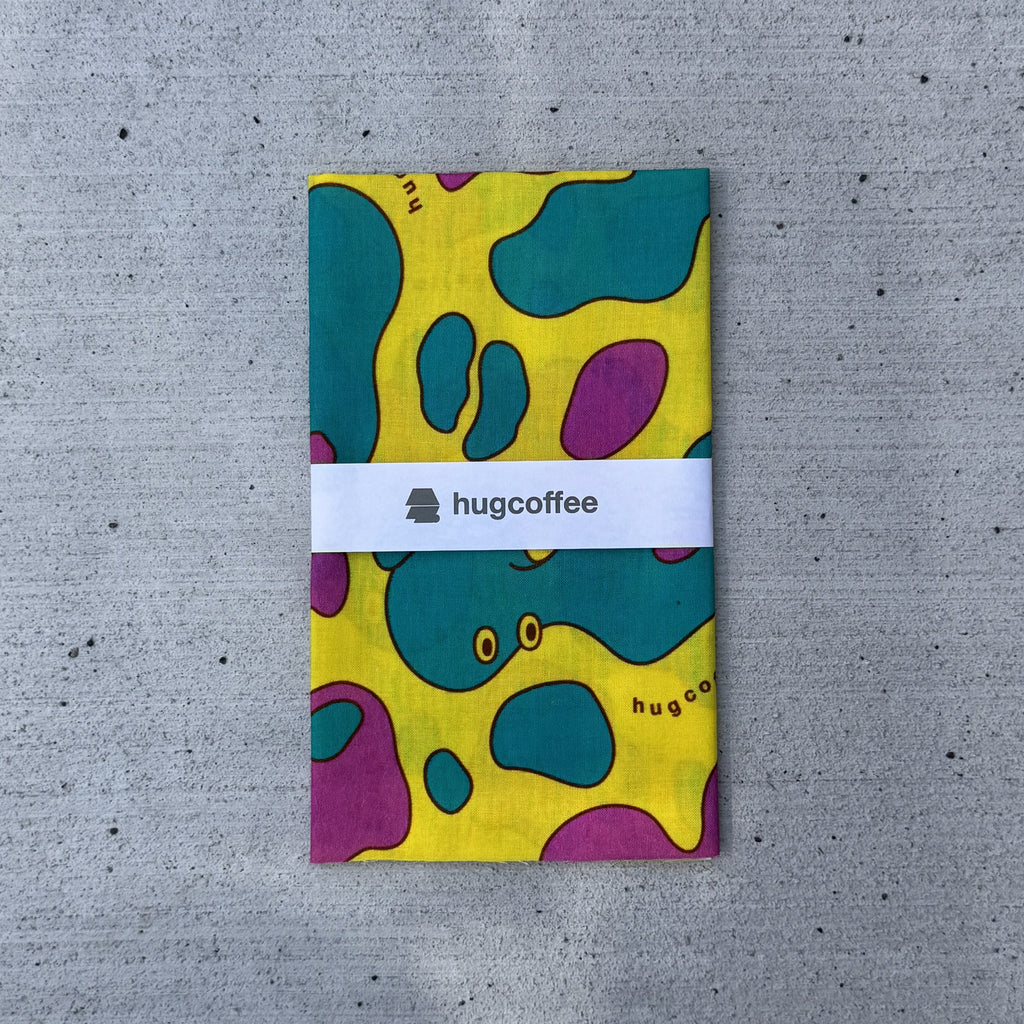 hugcoffee オリジナル手拭い – 「変幻自在、hugcoffee の仲間たちがあなたの日常に」